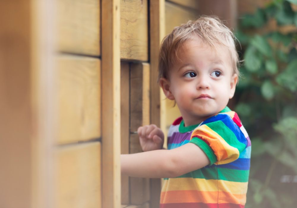 Little boy in rainbow tshirt