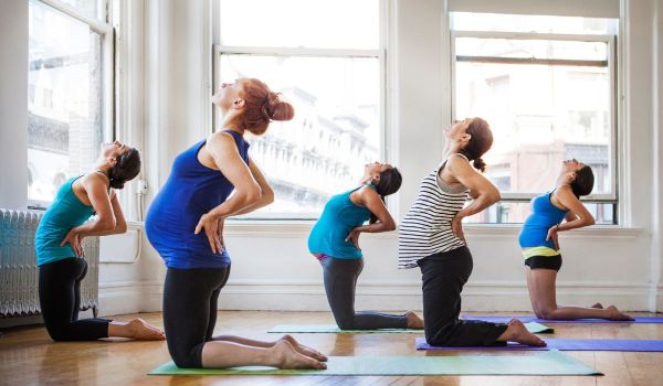 Pregnant women doing yoga