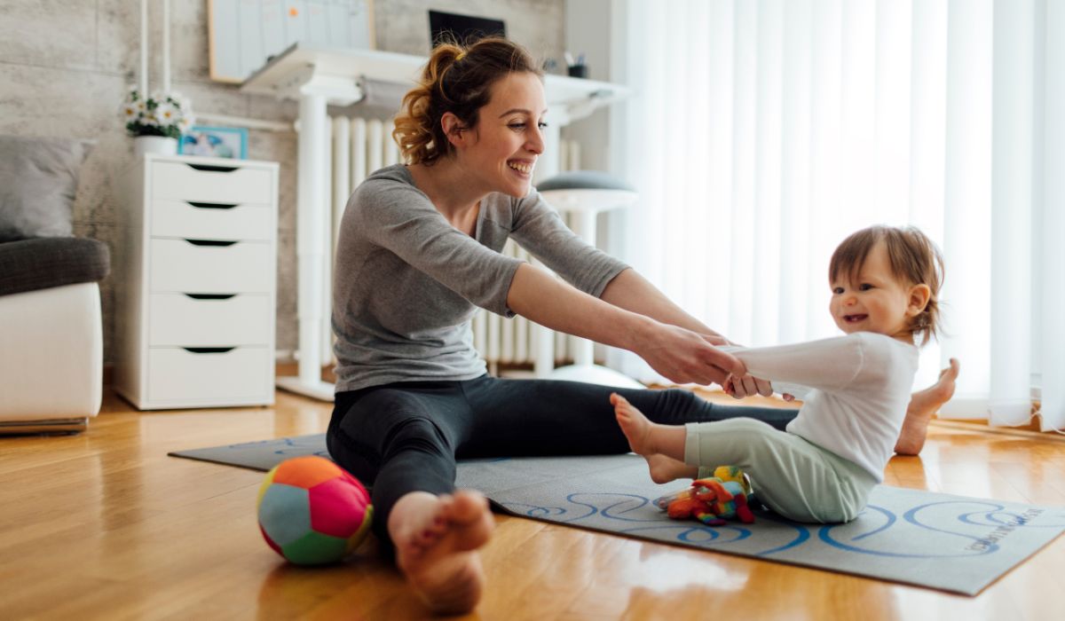 Mother working out with her child