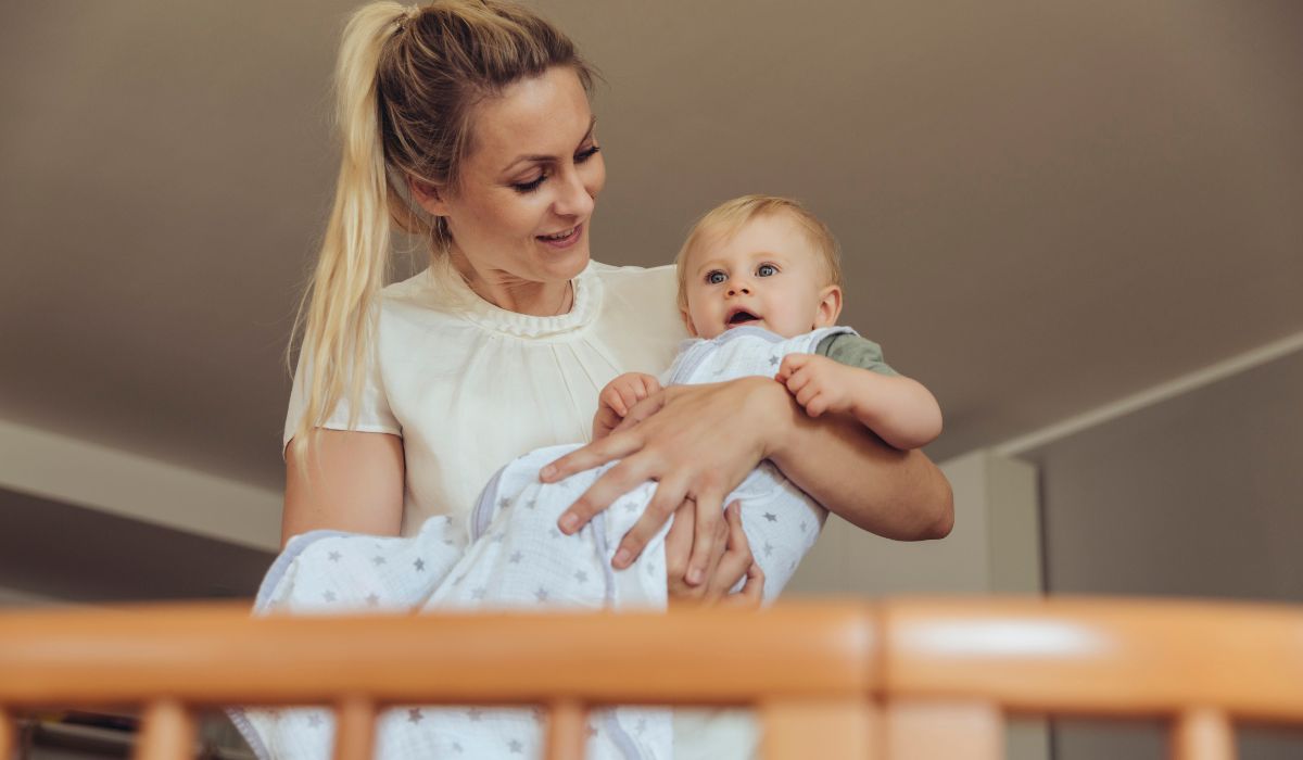 Mother and baby in a sleep suit