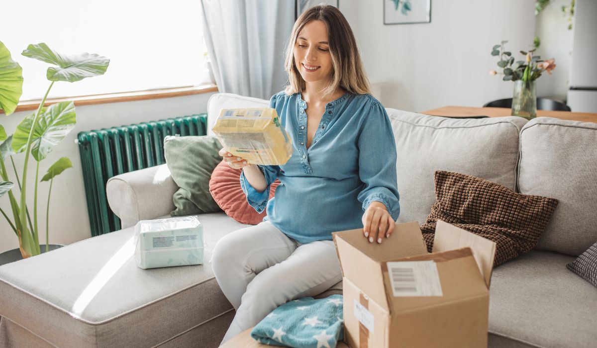 Pregnant woman with order of nappies