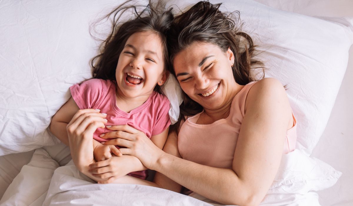 Mum and daughter laughing