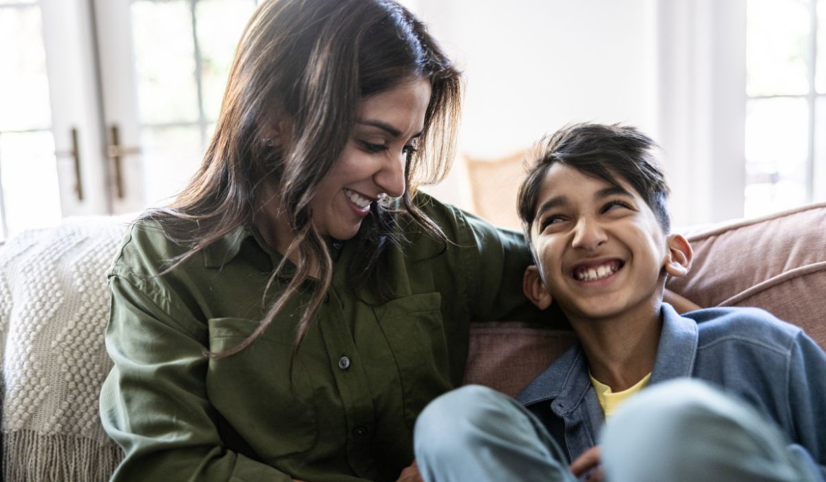 Mum and son laughing