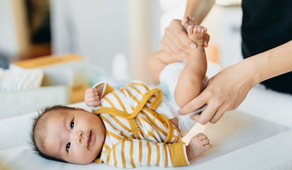 Baby being dressed