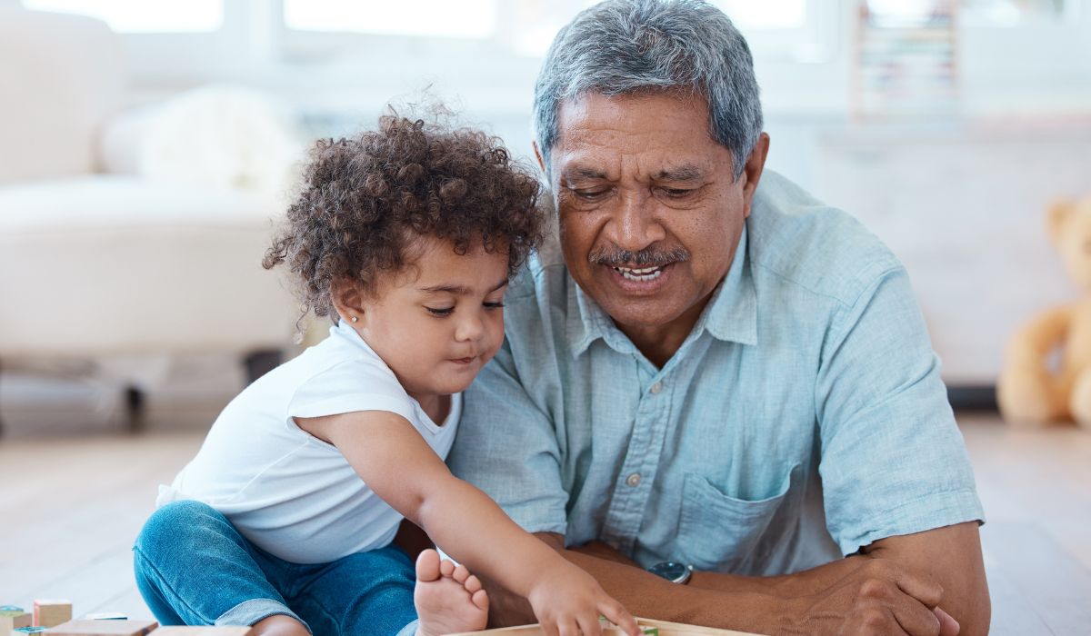 Grandad playing with grandchild