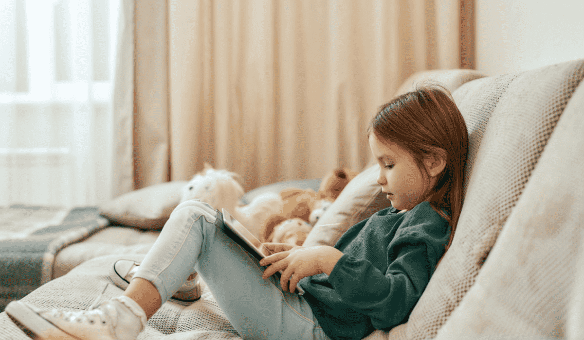 Little girl using an iPad