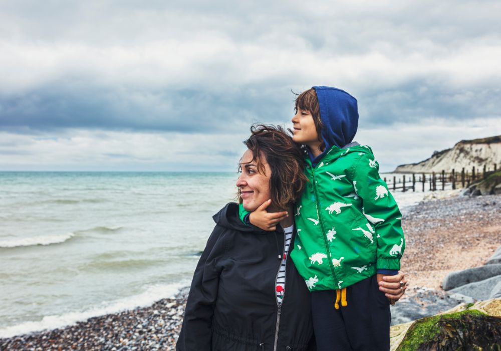Mother and son by the sea