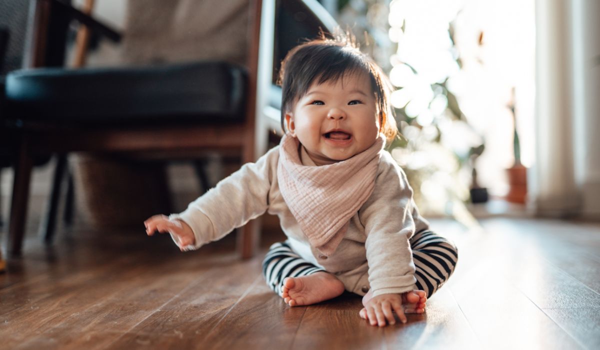Cute baby on living room floor