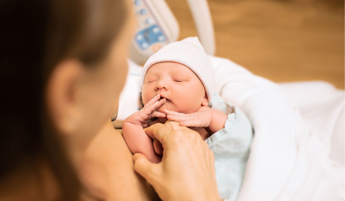 Newborn in his mother's arms