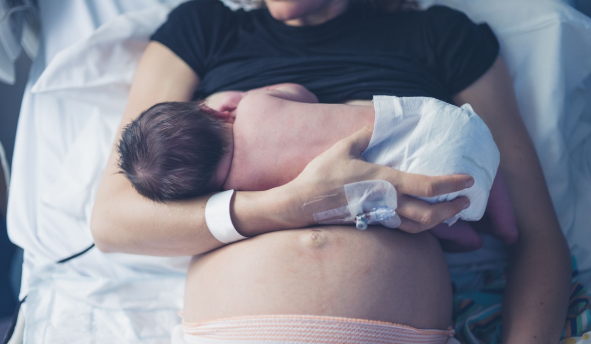 Woman with newborn baby