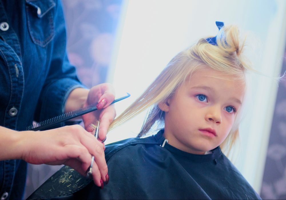 Girl getting hair cut