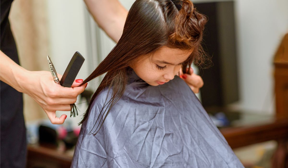 girl getting hair cut