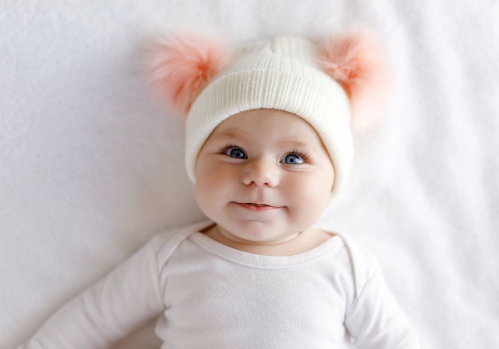 Cute baby girl on bed