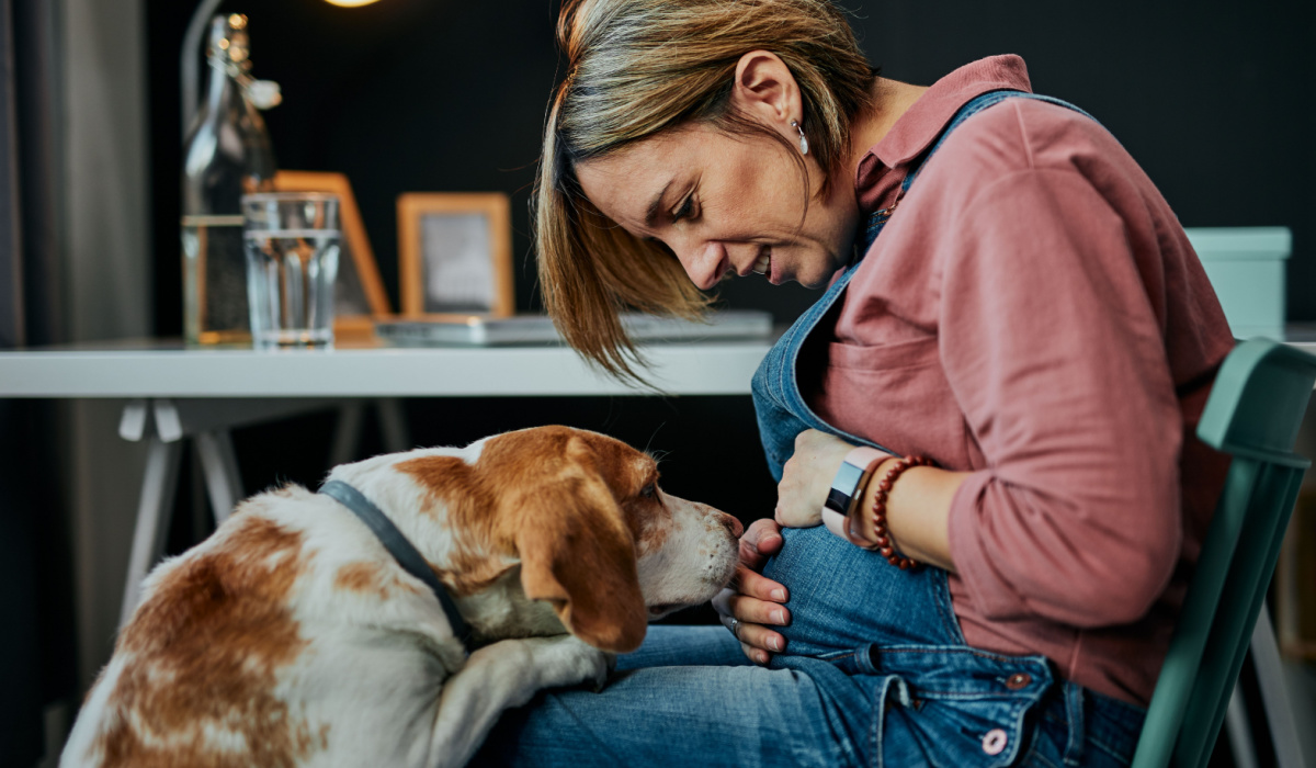 Pregnant woman with her dog