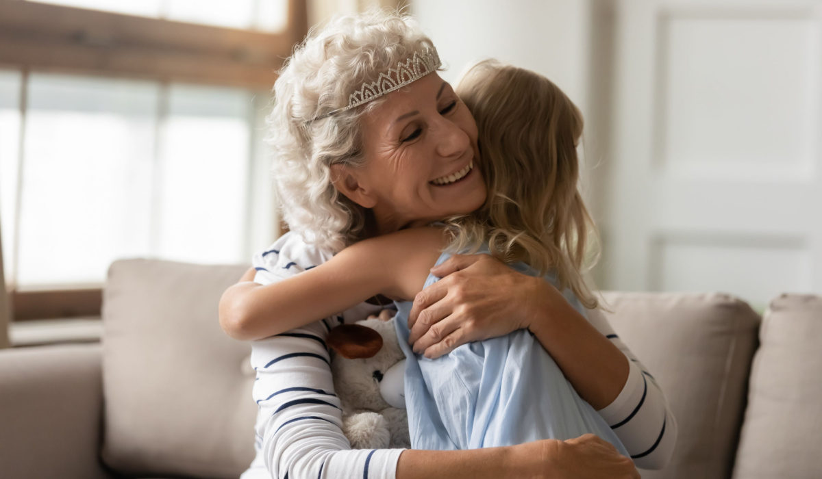 Grandmother hugging grandchild