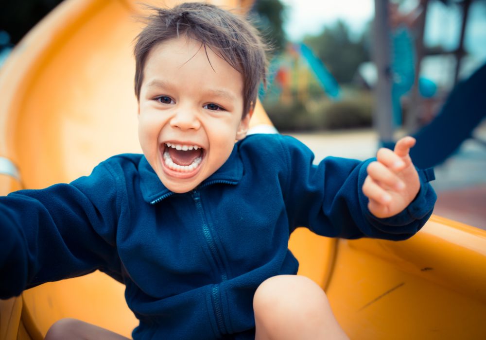 Little boy on slide
