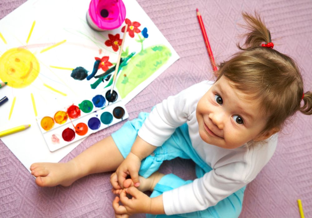 Little girl painting