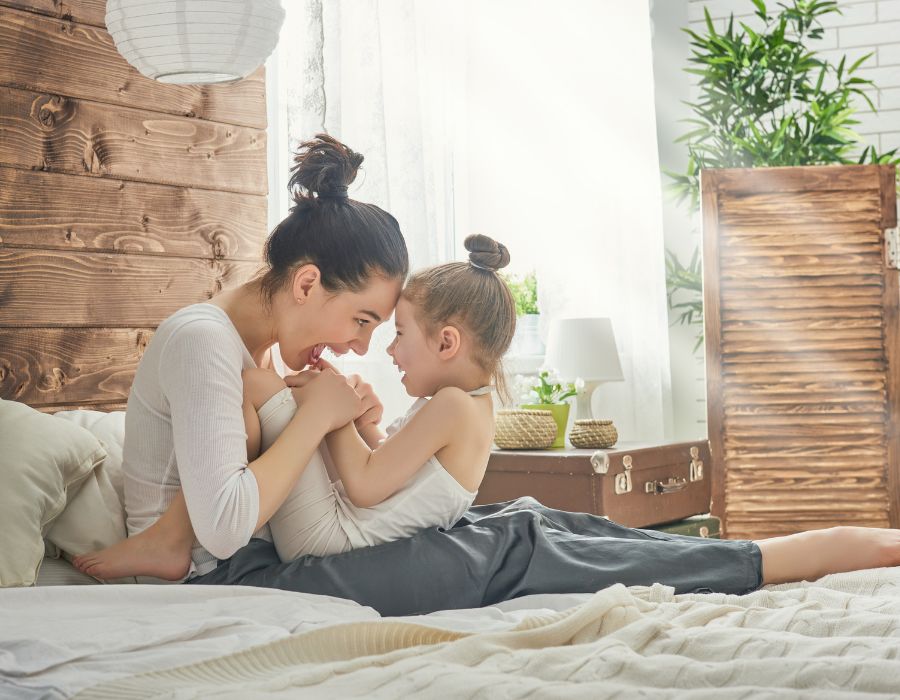 Mother and daughter playing