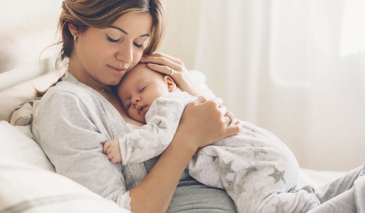 Mother cuddling baby