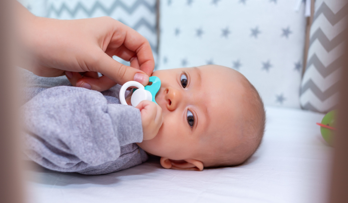 Young baby with dummy