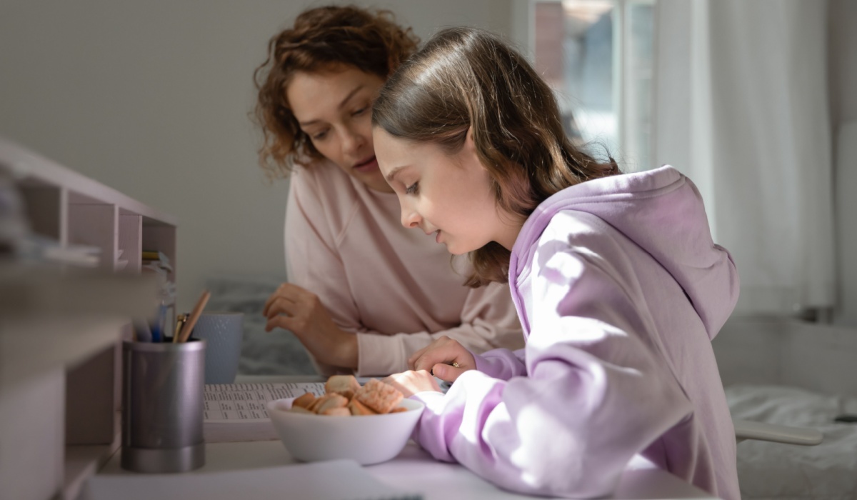 Mum and daughter doing homework