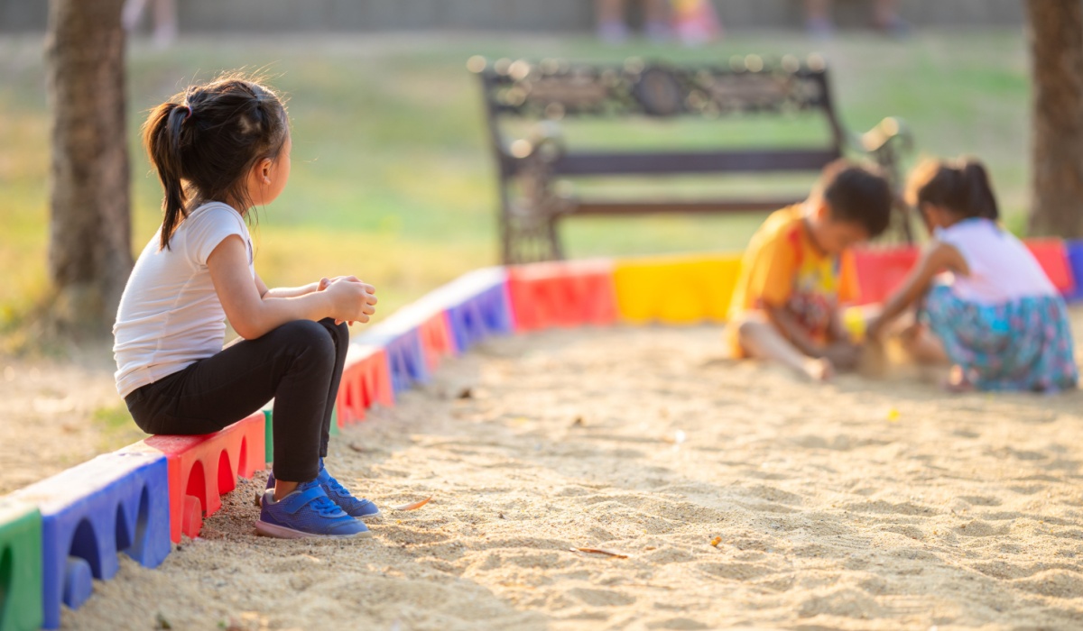Lonely girl at playground