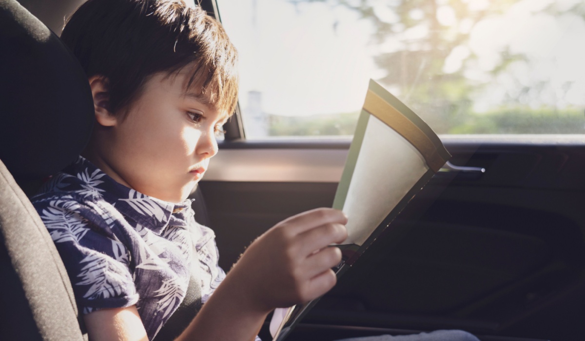 Young child in car seat in the car
