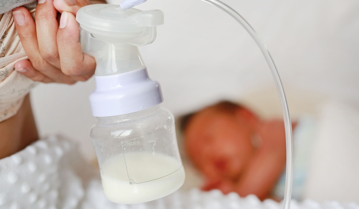 Mum using breast pump