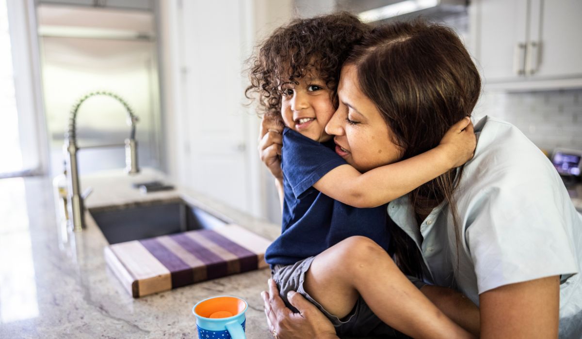 Mother hugging toddler
