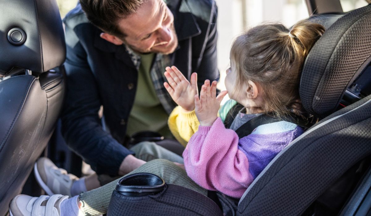 Little girl in car seat