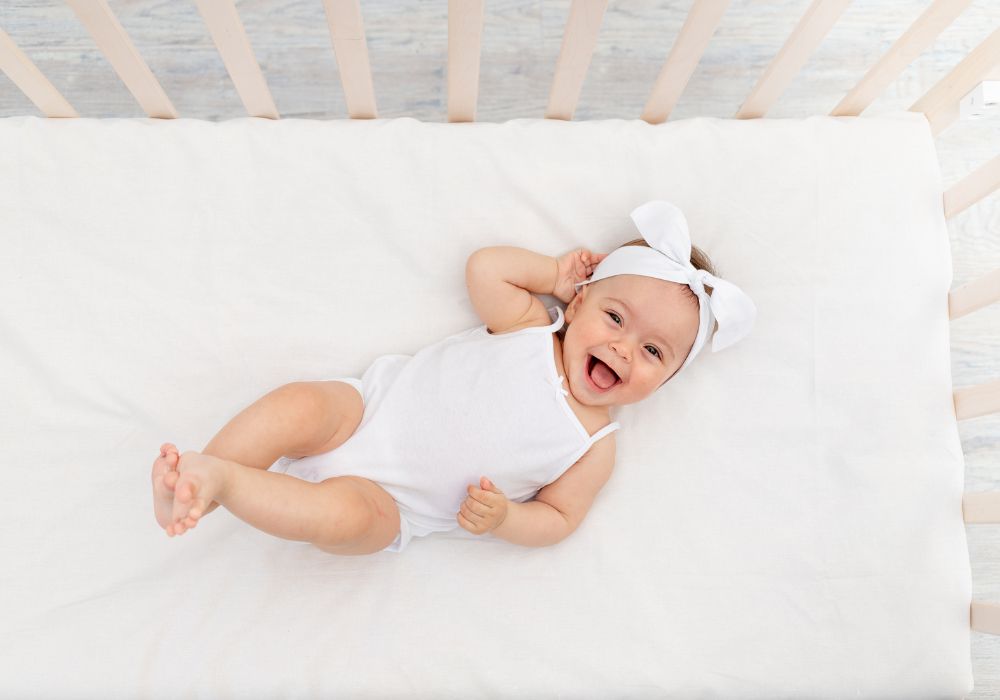 Newborn baby in crib