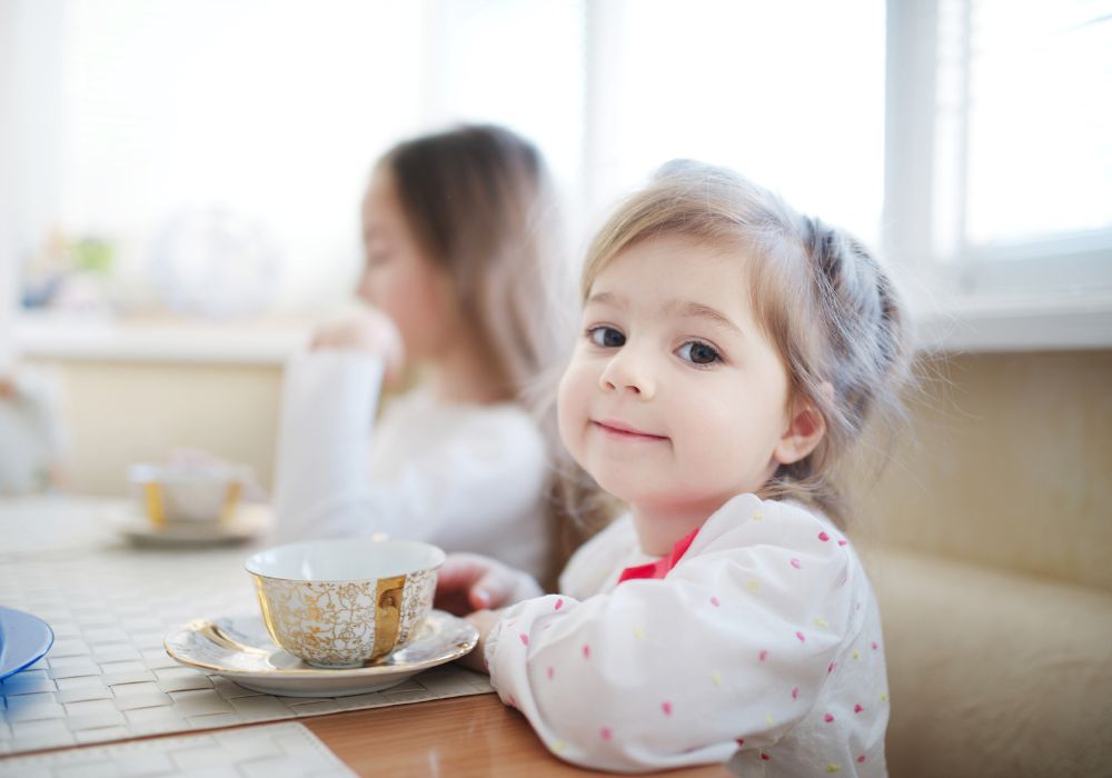 child drinking tea