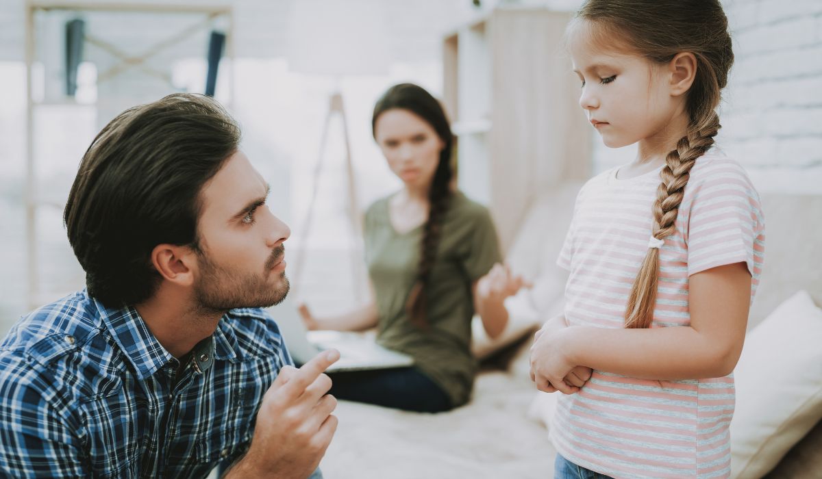 Father scolding daughter