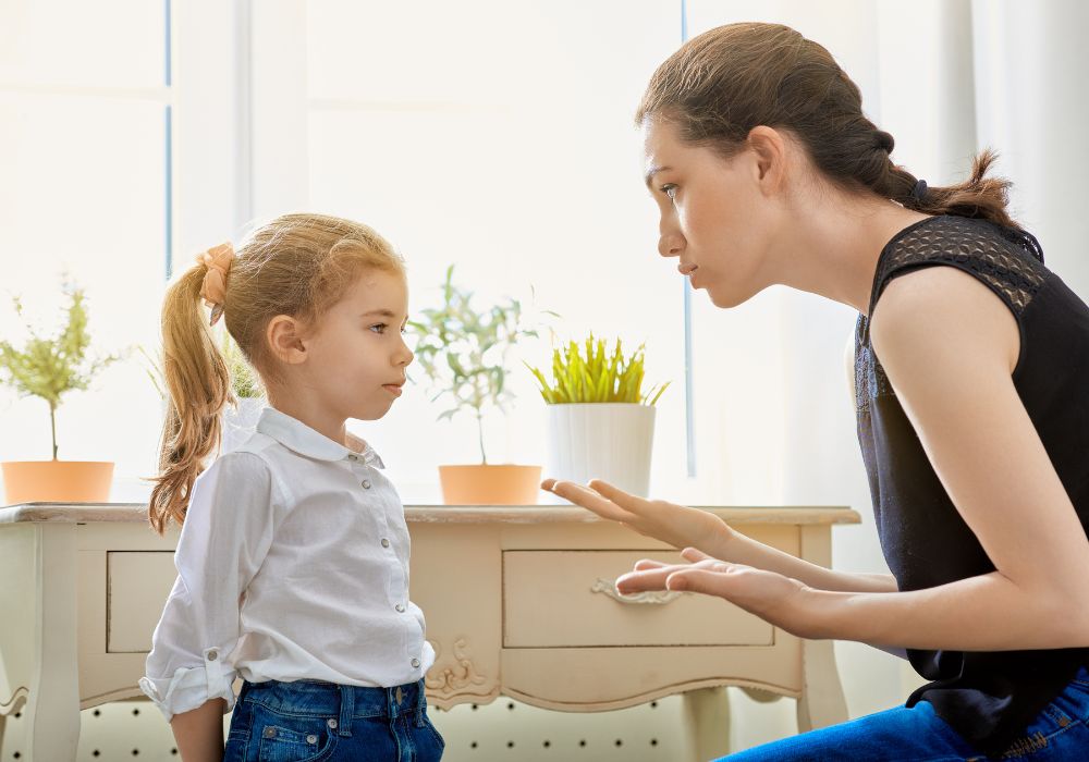 Mother giving out to daughter