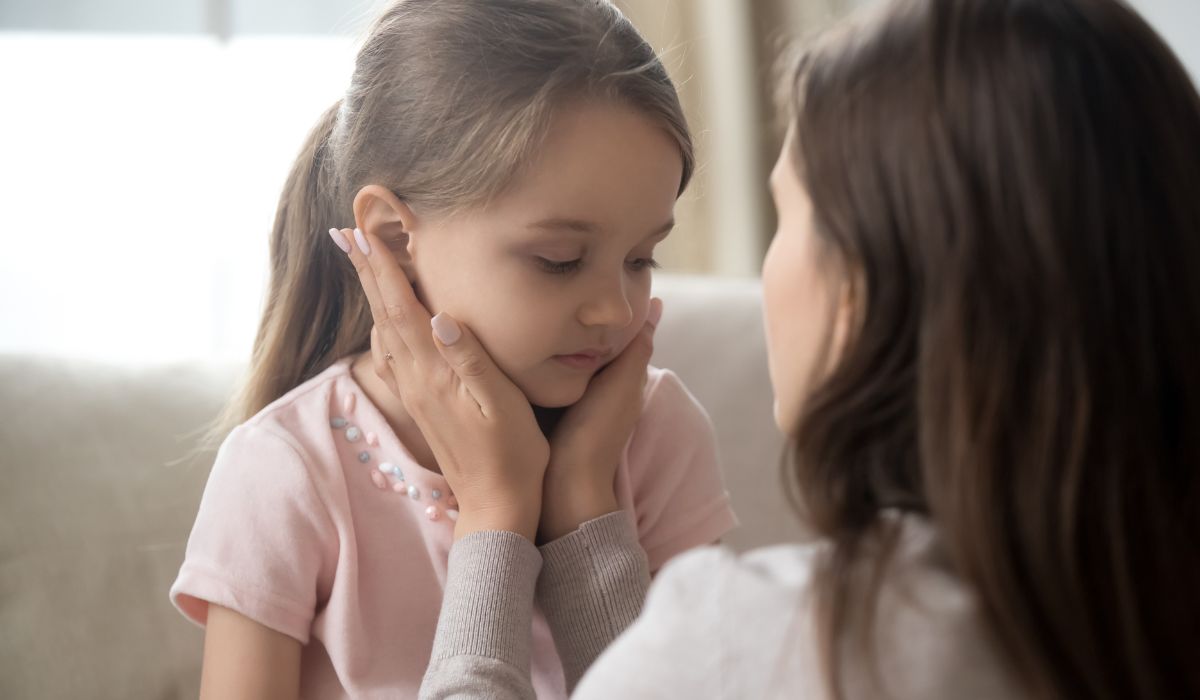 Mother talking to daughter