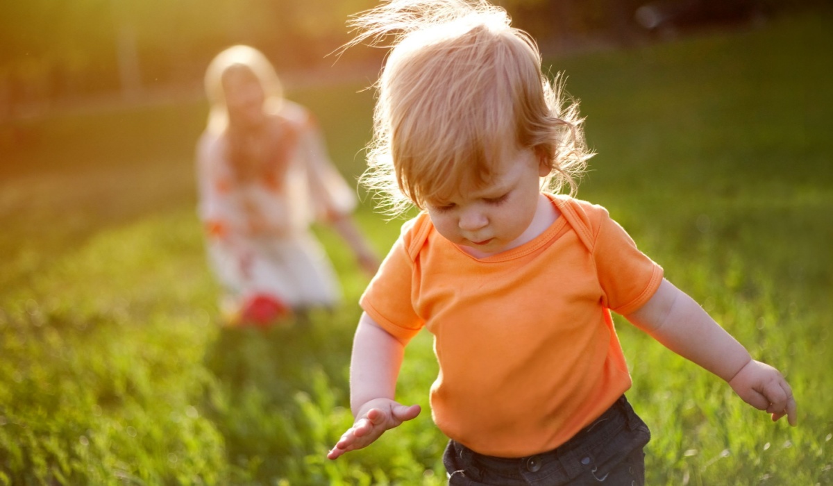 Toddler outside with mum