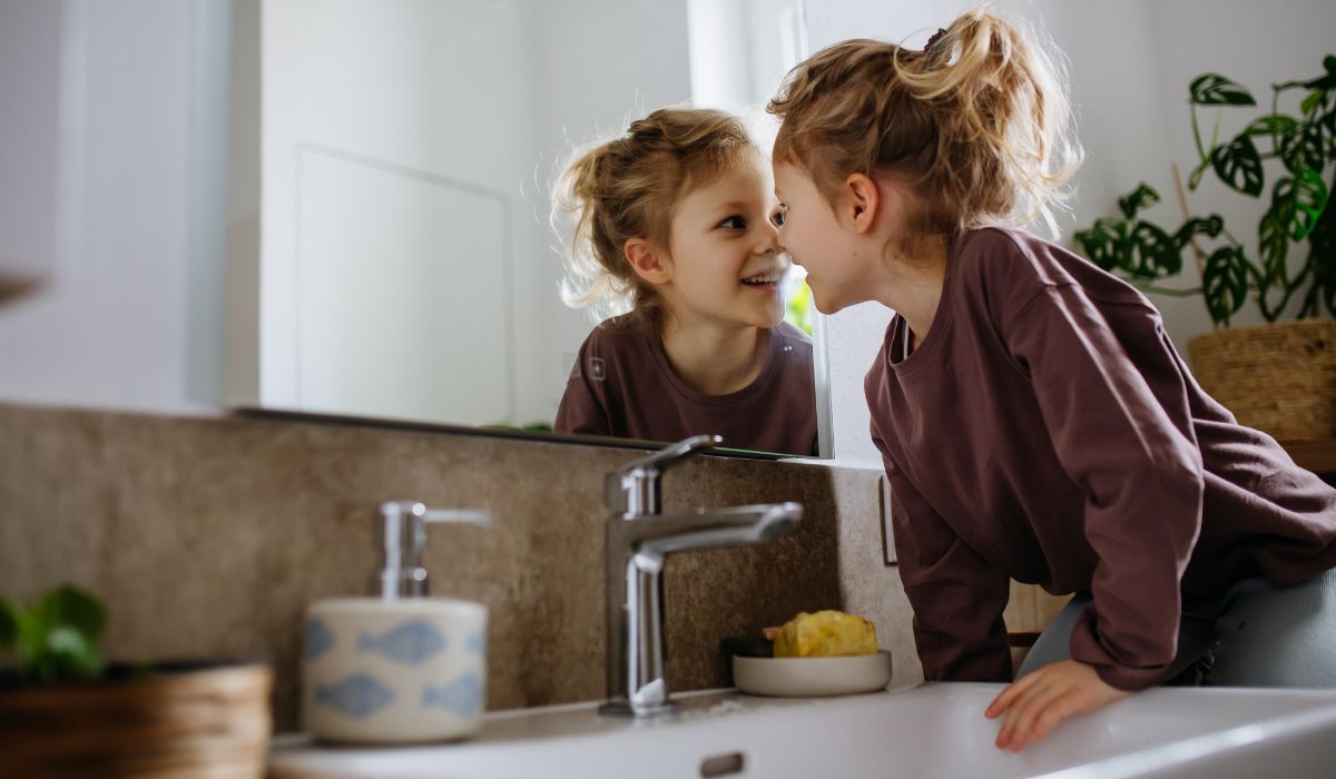 Little girl in bathroom