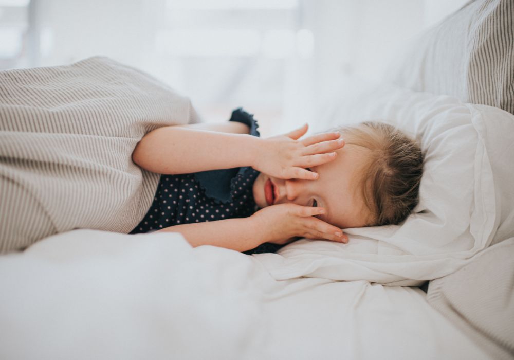 Little girl in bed