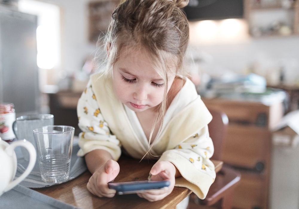 Little girl on phone