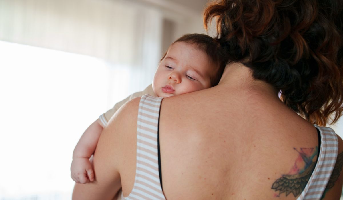 Mother winding baby