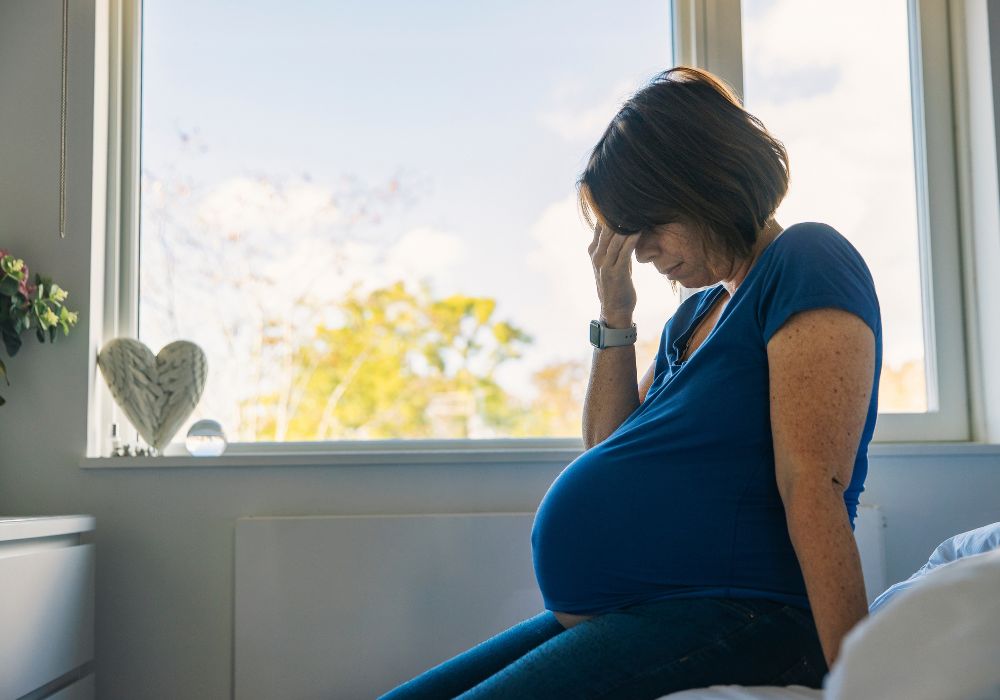 Sad pregnant woman