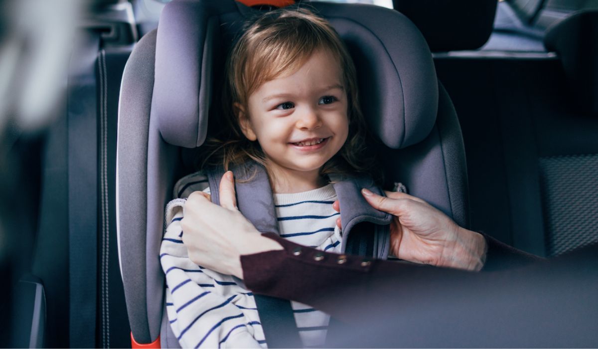 Little girl in car seat