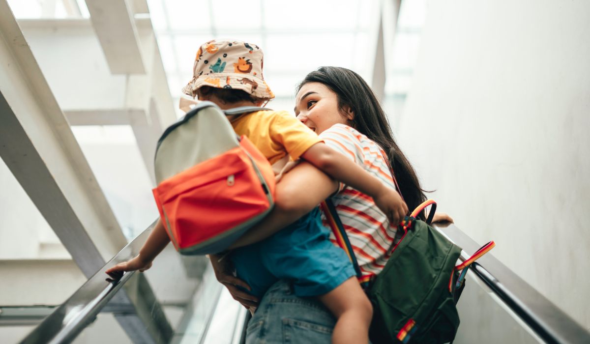 Mother in airport with baby