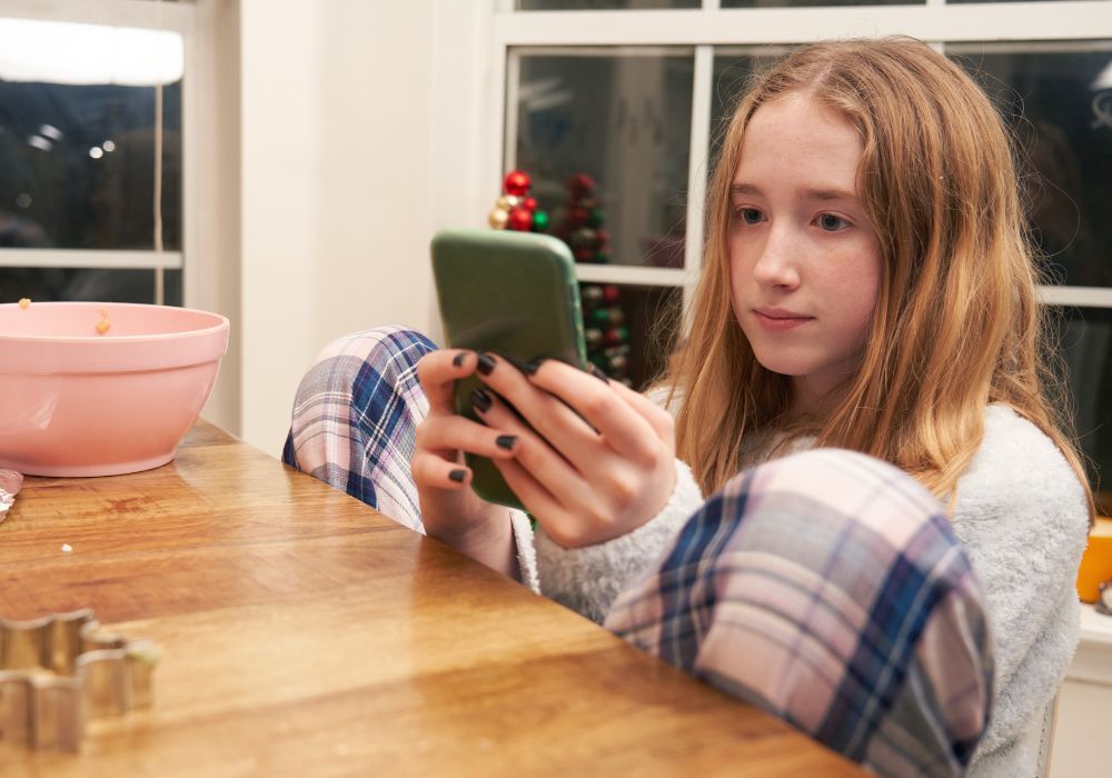 girl looking at phone