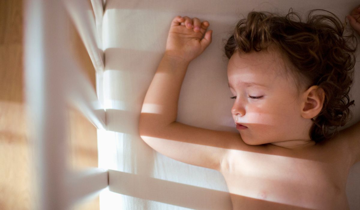 Baby sleeping in crib