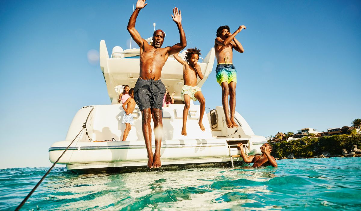 Family jumping off boat