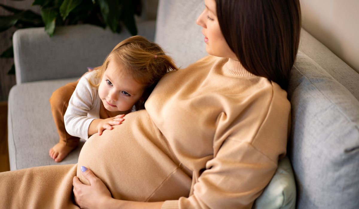 Pregnant womand and daughter