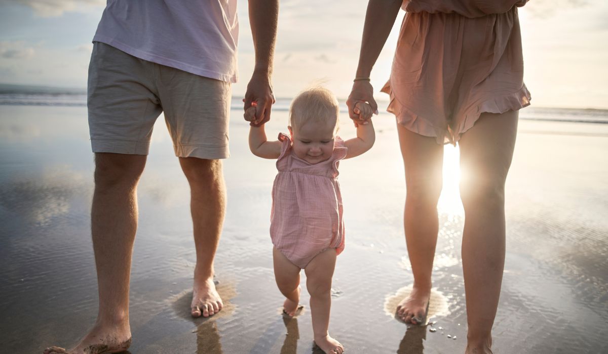 Parents and baby at the beach