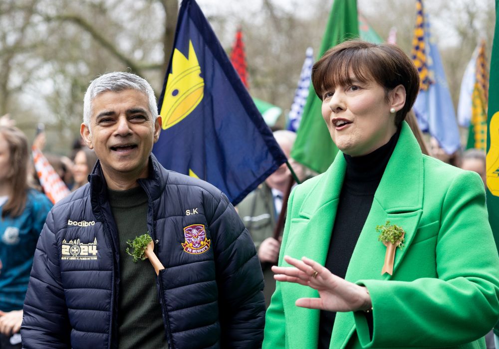 Mayor of London, Sadiq Khan (L) and the Minister of Education for Ireland, Norma Foley (R), are seen at the front of the celebration parade for St Patrick's Day in London.
