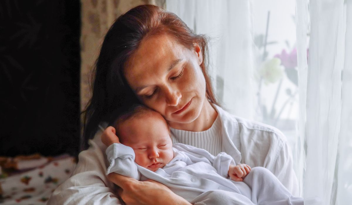 Mother holding her baby